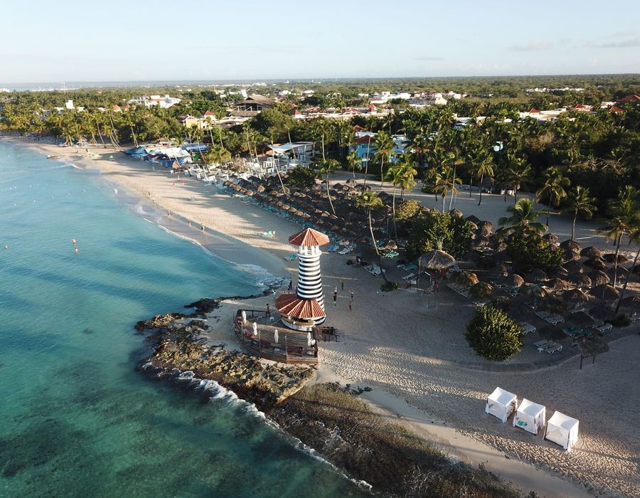Aerial view of Dominicus Beach and its lighthouse